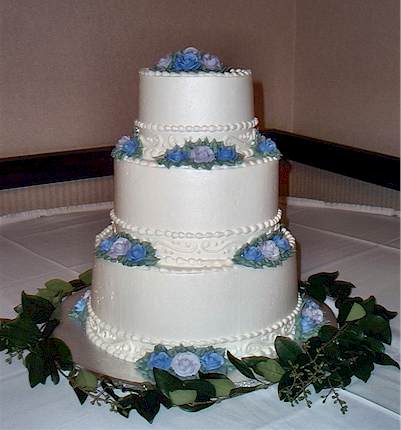 Re Ivory weddings cakes with blue accents or blue wedding cakes with white